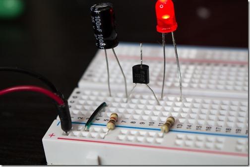 How to build a simple blinking led circuit with a capacitor, transistor and  two resistors